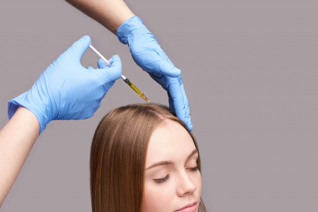 Injection a woman with Platelet Rich Plasma for Hair Growth - Hair Restoration Savannah